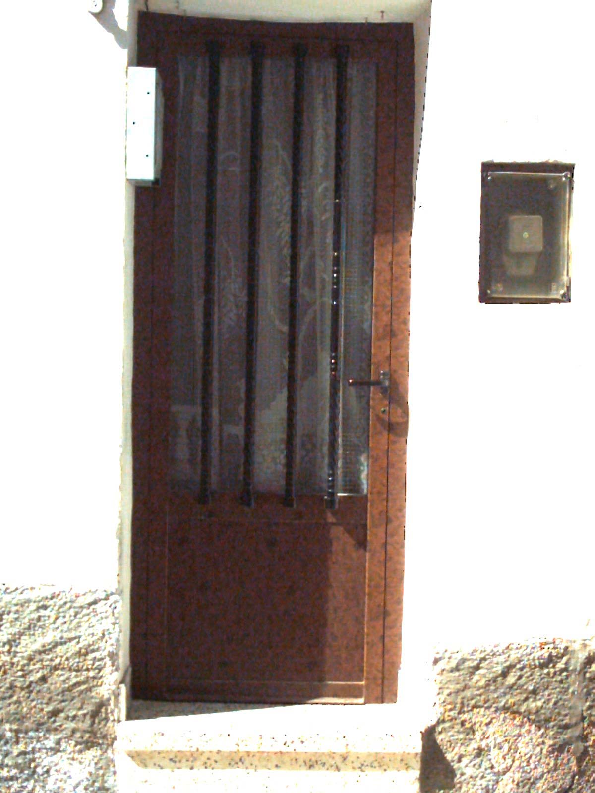 Puerta Barrotes Cristal