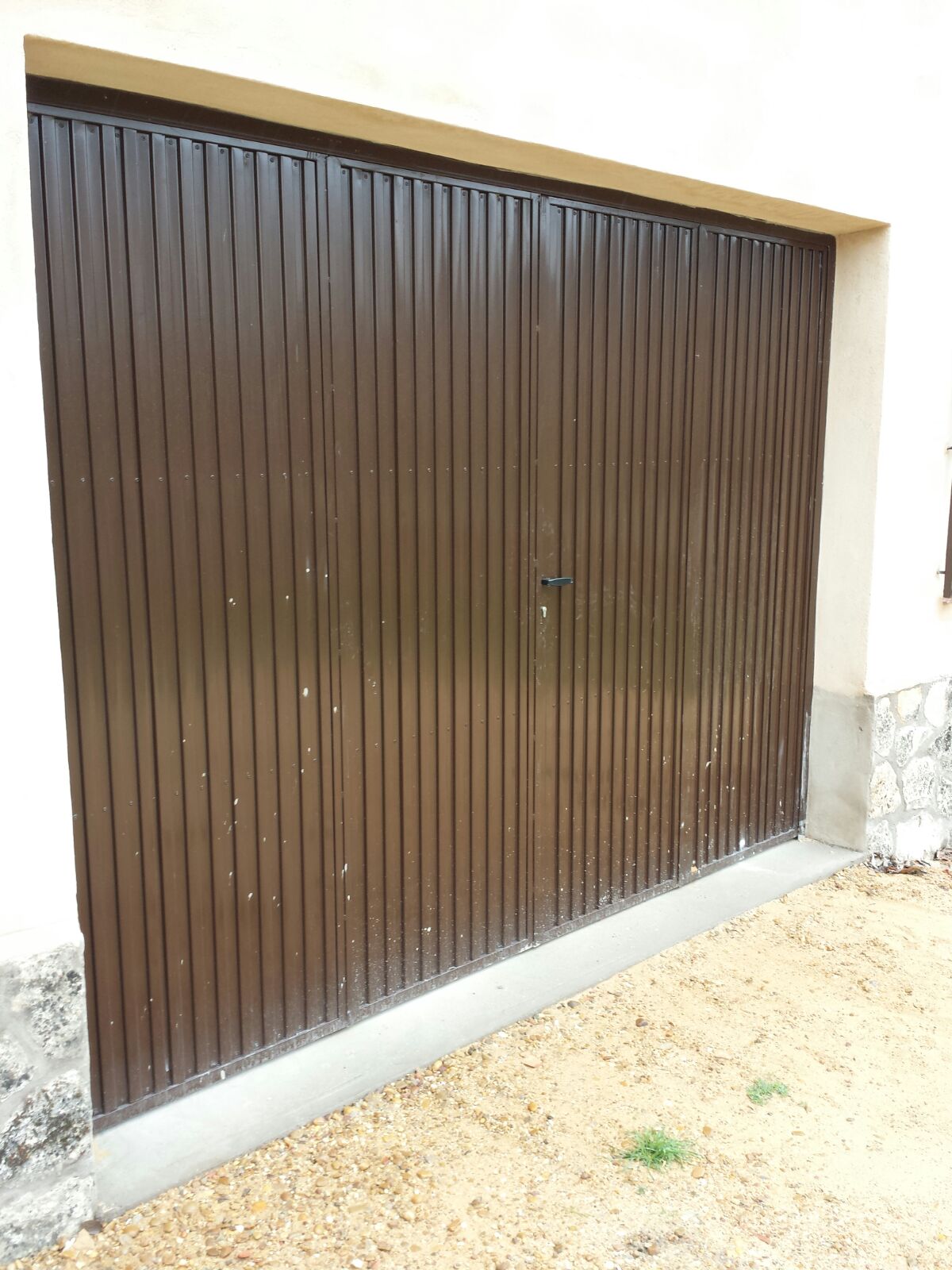 Puerta garaje cuatro hojas, ciega